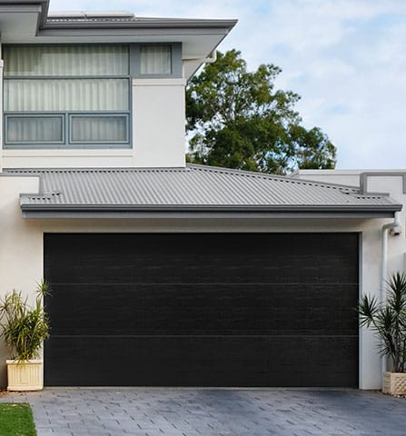 h-flush-closed-black-steel-double-garage-door.jpg